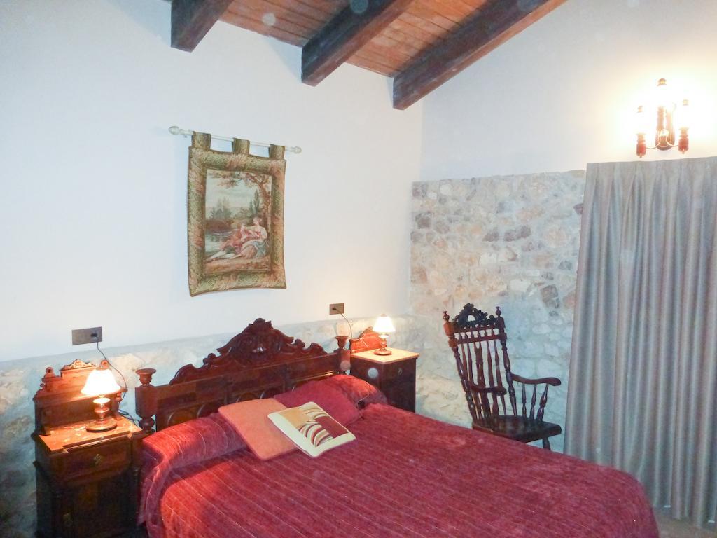 Viladomatrural La Nou de Gayá Pokoj fotografie