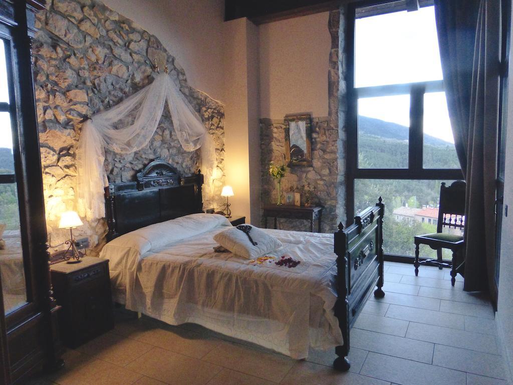 Viladomatrural La Nou de Gayá Pokoj fotografie