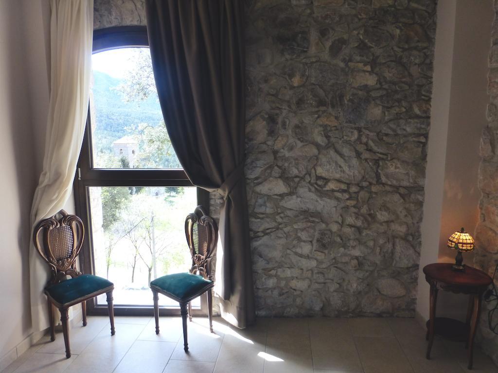 Viladomatrural La Nou de Gayá Pokoj fotografie